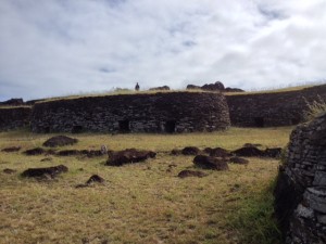 The reconstructed ceremonial house at Orongo, on Easter Island, where a moai, or statue of a giant head—now in the British Museum—once stood.
