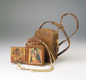 An icon and carrying case from Ethiopia, dating to the 18th or 19th century. Faithful travelers would wear icons like around the neck for protection.