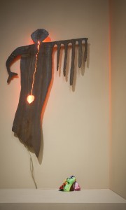 The bird-like creatures above, evoking Mother Nature kissing humanity, in the context of the Native American gallery.