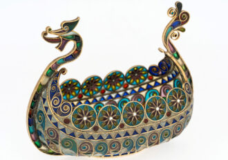 small silver and enamel sculpture of a Viking dragon boat