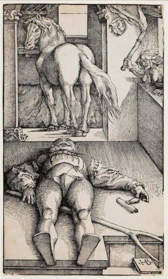 image of a stable, with a horse and a stable hand laying on the ground