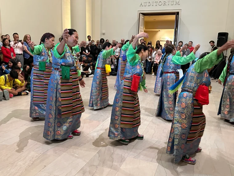 Dancers from the Tibetan AmericanFoundation of Minnesota wearing traditional Tibetan clothing perform at Mia