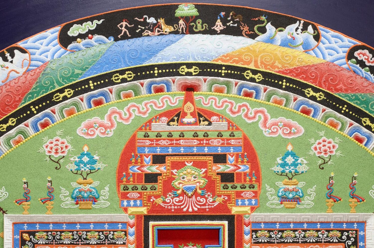 close-up view of a colored sand mandala