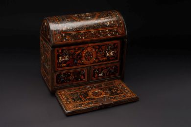 rectangular box with rounded hinged top; hinged front opens to reveal top inner rectangular compartment with two drawers