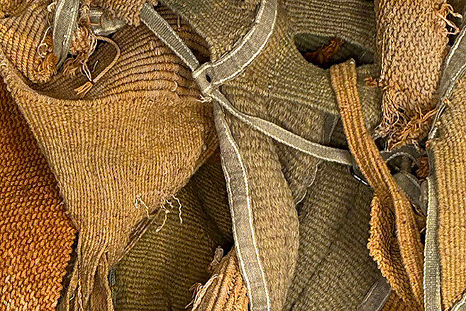 close up view of brown, woven textiles with overlapping strings