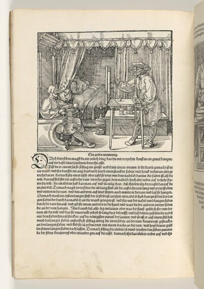 book page depicting an artist drawing a person, with text below the image