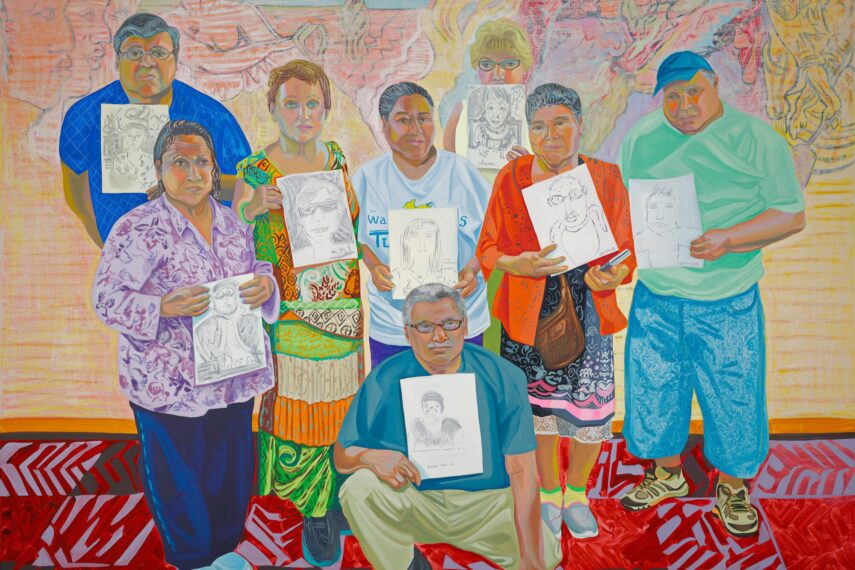 Eight people in colorful outfits holding drawings with a colorful mural background.