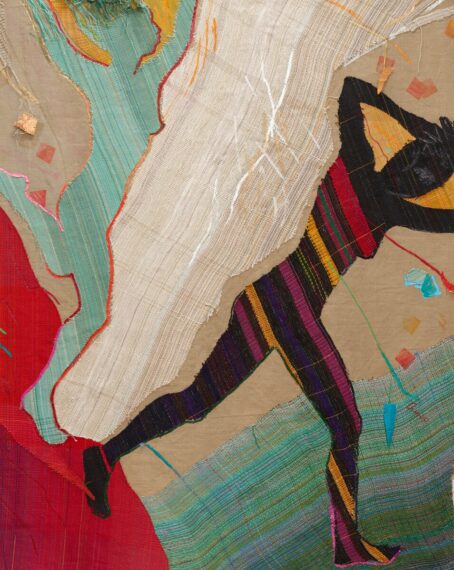 Colorful textile art with abstract shapes and patterns