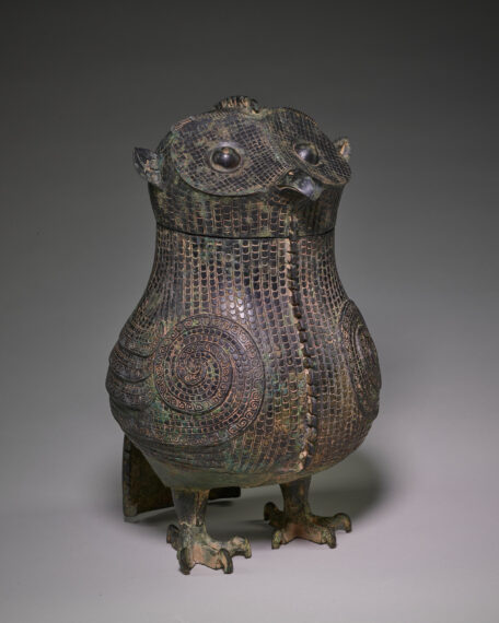 Bronze owl-shaped vessel with detailed carvings
