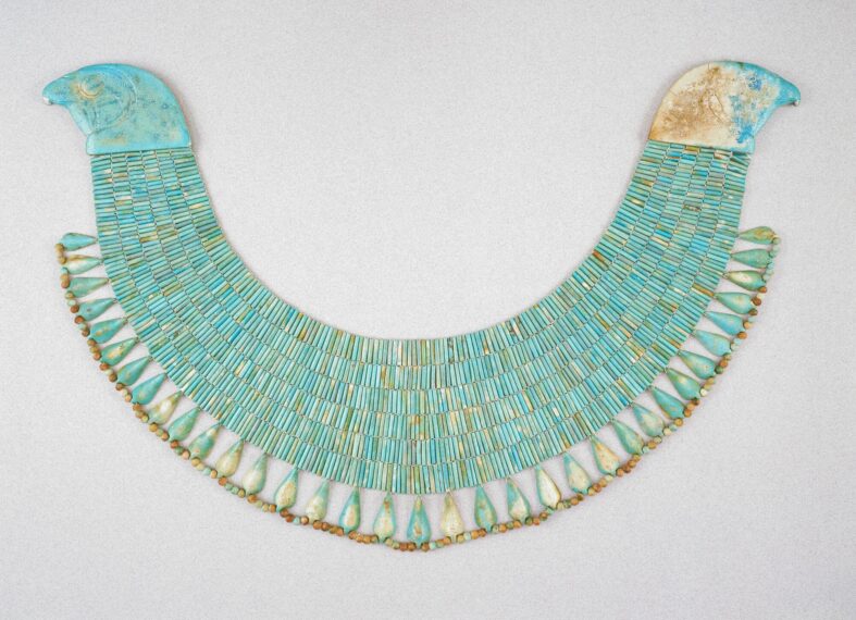 Turquoise beaded collar necklace with bird-shaped ends.