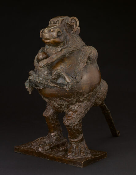 sculpture of a baboon holding its baby