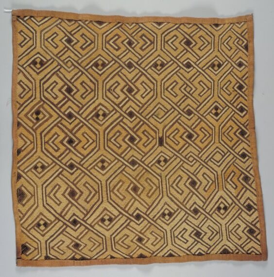 Geometric patterned textile with earthy tones.