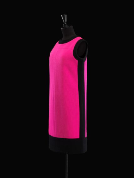 Bright pink sleeveless dress on a mannequin